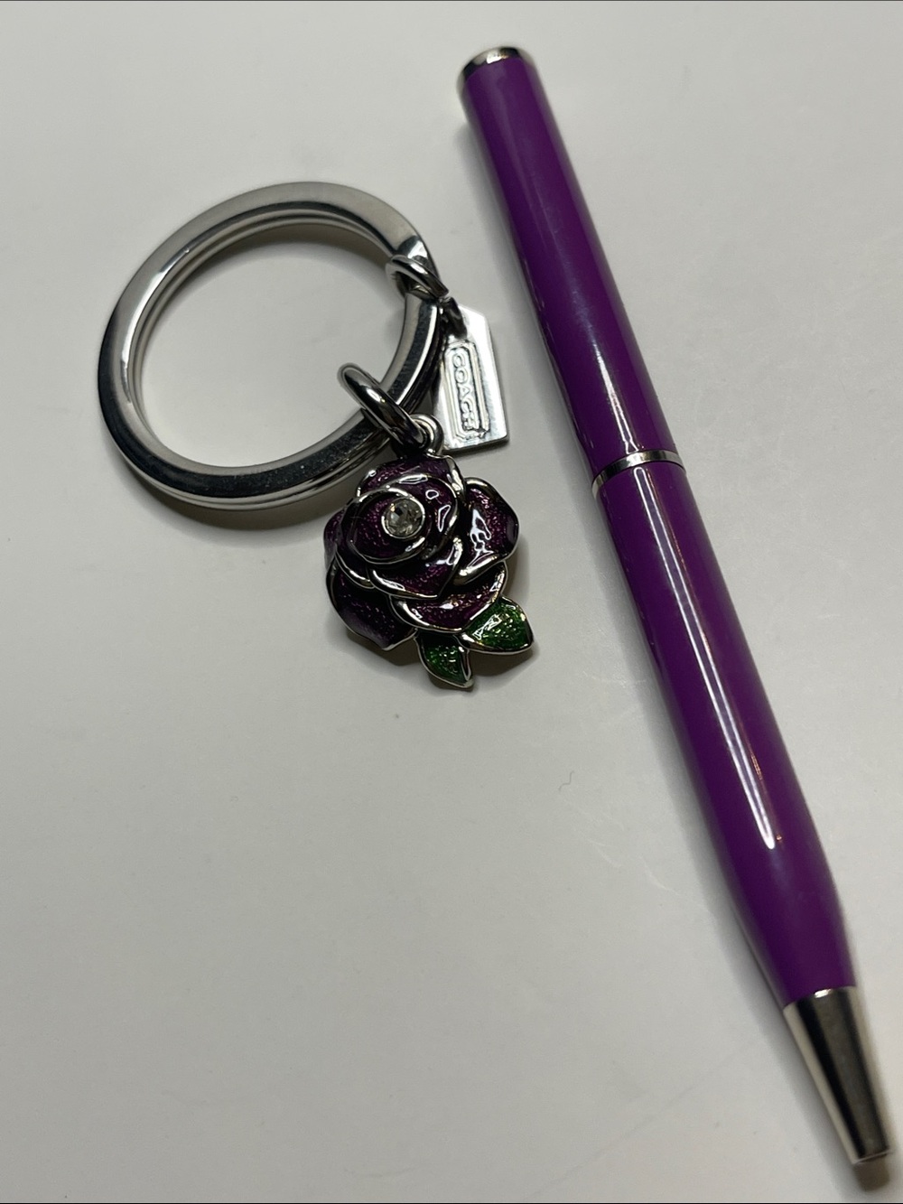 Coach Purple Rose Enamel Keyring and Coach Pen